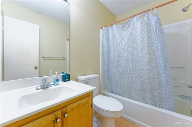 full bathroom with tile patterned flooring, a textured ceiling, toilet, shower / tub combo with curtain, and vanity