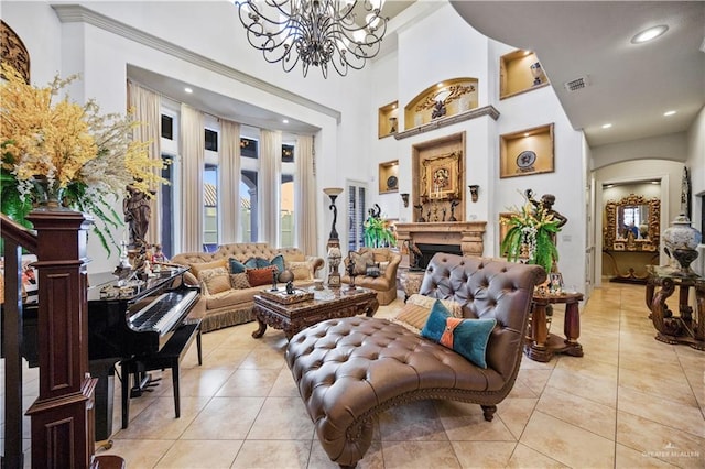 1901 Pecos St, Mission, TX 78572 - living area with a chandelier, light tile patterned floors, recessed lighting, a towering ceiling, and a fireplace