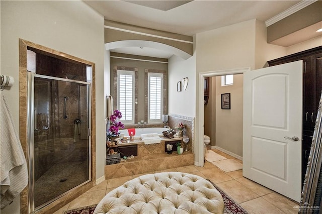 1901 Pecos St, Mission, TX 78572 - bathroom with a bath, a shower stall, tile patterned floors, and ornamental molding