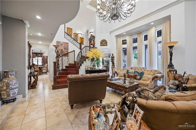 1901 Pecos St, Mission, TX 78572 - living area featuring a chandelier, stairs, light tile patterned floors, recessed lighting, and arched walkways