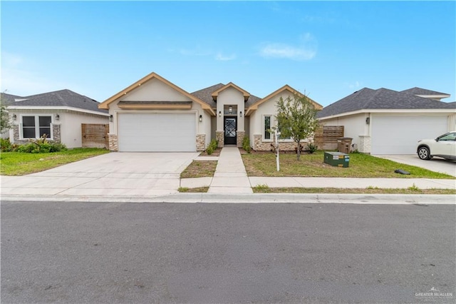 view of front facade featuring an attached garage, concrete driveway, stone siding, stucco siding, and a front lawn