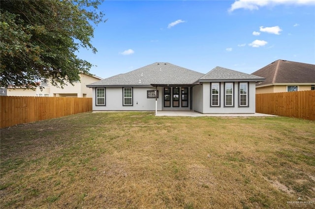 604 Hackberry Ave, Mission, TX 78572 - back of house with a patio area and roof with shingles