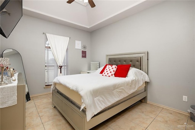 tiled bedroom with ceiling fan