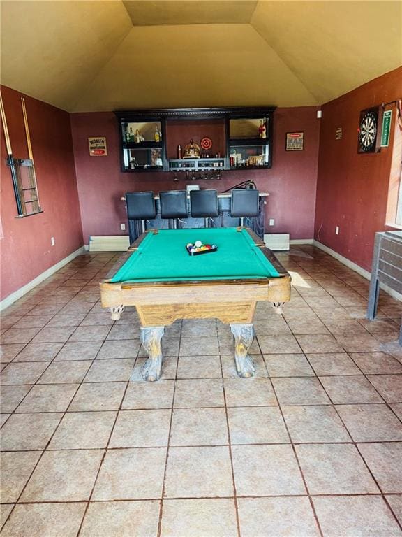 recreation room featuring lofted ceiling, tile patterned floors, and pool table