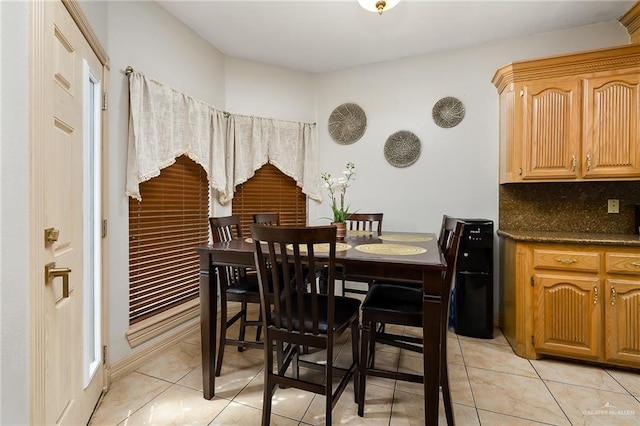 dining room with light tile patterned floors