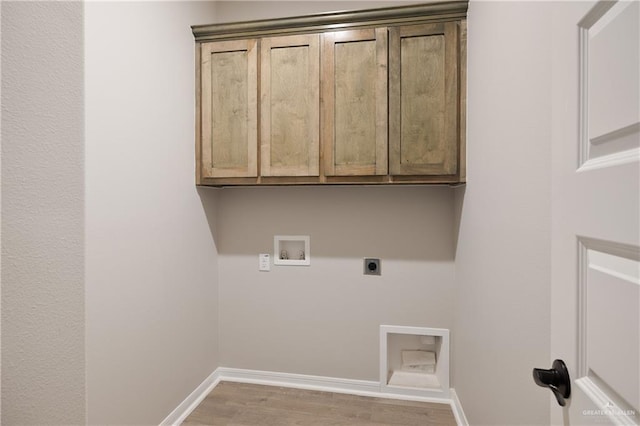 8329 N 35th St, Mcallen, TX 78504 - laundry room featuring hookup for an electric dryer, washer hookup, cabinet space, and wood finished floors