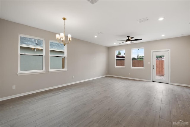 8329 N 35th St, Mcallen, TX 78504 - unfurnished room featuring ceiling fan, wood finished floors, a chandelier, and recessed lighting