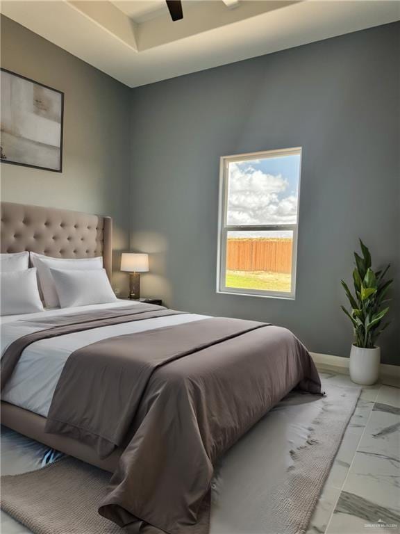 bedroom featuring ceiling fan