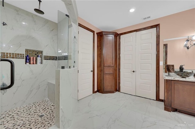 2000 Shelby St, Mission, TX 78572 - full bathroom with marble finish floors, a marble finish shower, vanity, recessed lighting, and a chandelier