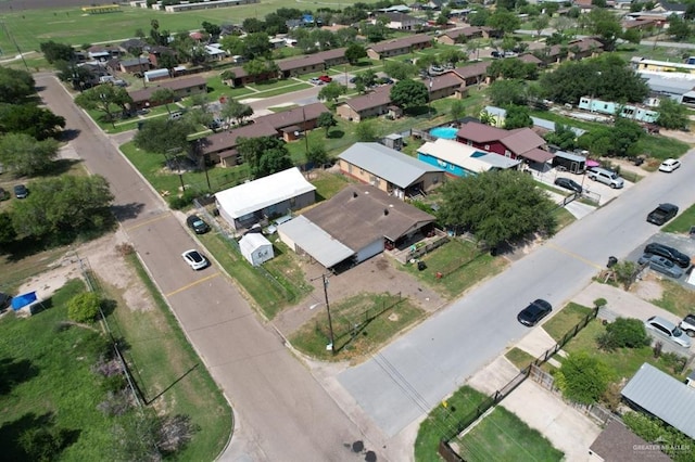 601 E Ricky Crossland Ave, Elsa, TX 78543 - aerial view of property and surrounding area with nearby suburban area