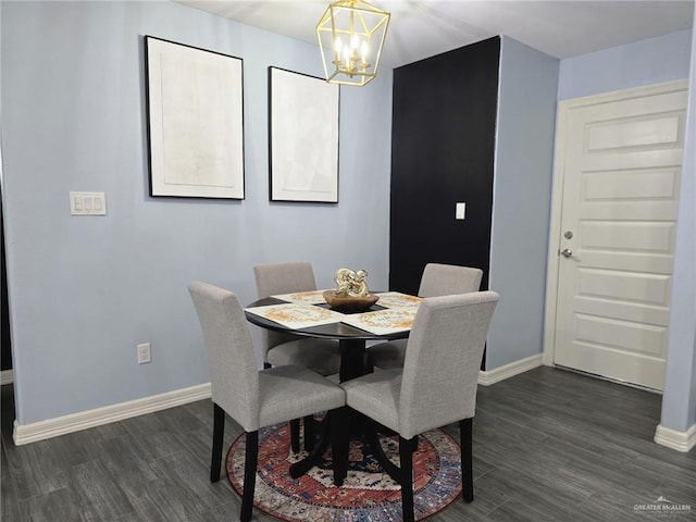 442 La Villita Dr, Donna, TX 78537 - dining area with baseboards, a notable chandelier, and dark wood-style floors