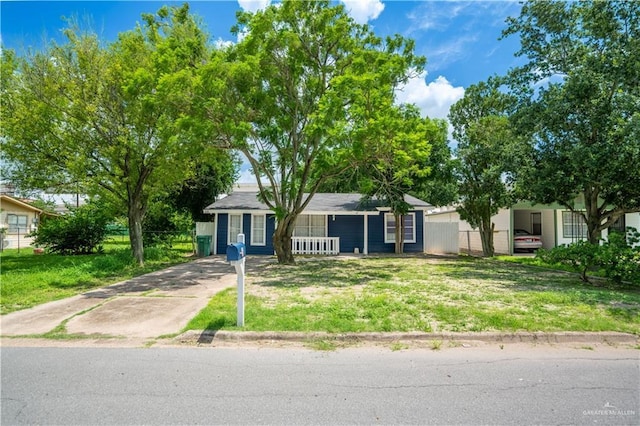 218 W Eller Ave, Pharr, TX 78577 - ranch-style house with driveway and a porch