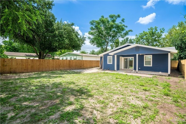 218 W Eller Ave, Pharr, TX 78577 - back of property with a fenced backyard and a patio area