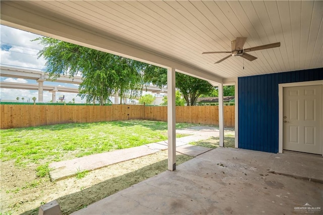 218 W Eller Ave, Pharr, TX 78577 - fenced backyard with a patio area and ceiling fan