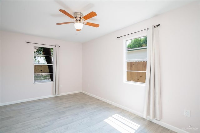 218 W Eller Ave, Pharr, TX 78577 - empty room with light wood-type flooring and a ceiling fan