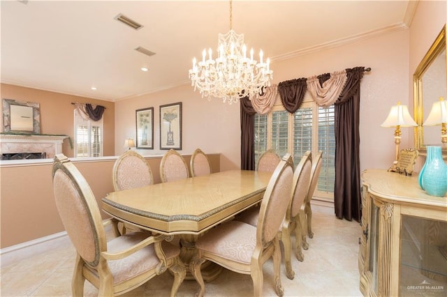 tiled dining area featuring crown molding, a wealth of natural light, and a chandelier