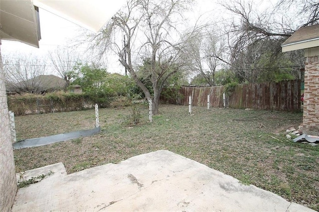 view of yard with a patio and fence private yard