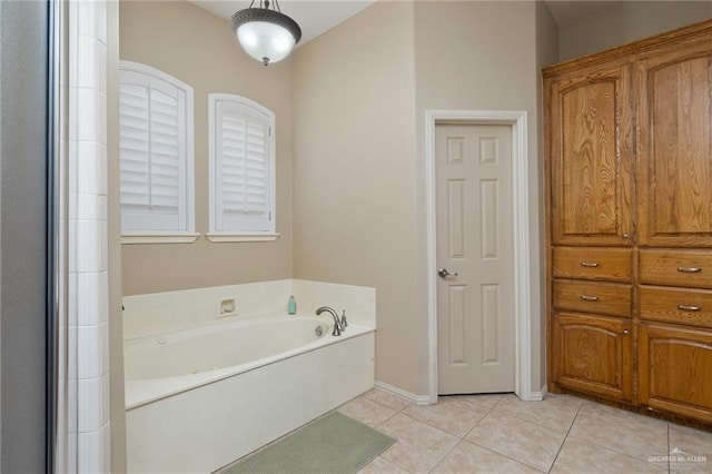 5109 Quince Ave, Mcallen, TX 78501 - full bathroom featuring tile patterned flooring, a garden tub, and baseboards