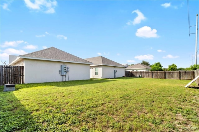 view of yard featuring a fenced backyard