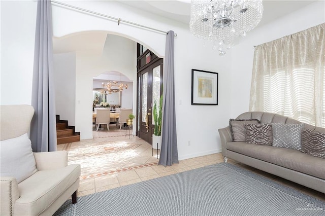 interior space with a chandelier and tile patterned floors