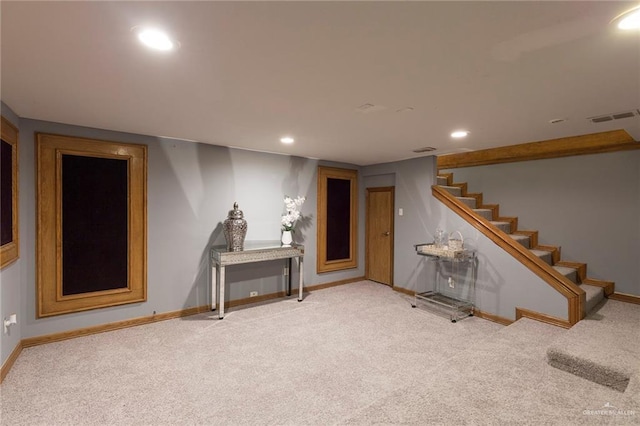 basement featuring carpet flooring