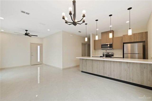 1901 W Violet Dr, Pharr, TX 78577 - kitchen featuring stainless steel appliances, modern cabinets, light countertops, baseboards, and ceiling fan
