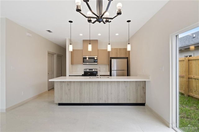 1901 W Violet Dr, Pharr, TX 78577 - kitchen with stainless steel appliances, modern cabinets, light countertops, baseboards, and a sink