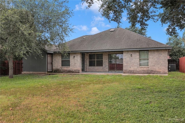 1821 S Petunia Ave, Weslaco, TX 78596 - rear view of property featuring a shingled roof and a patio