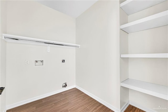 washroom with washer hookup, hardwood / wood-style flooring, and hookup for an electric dryer