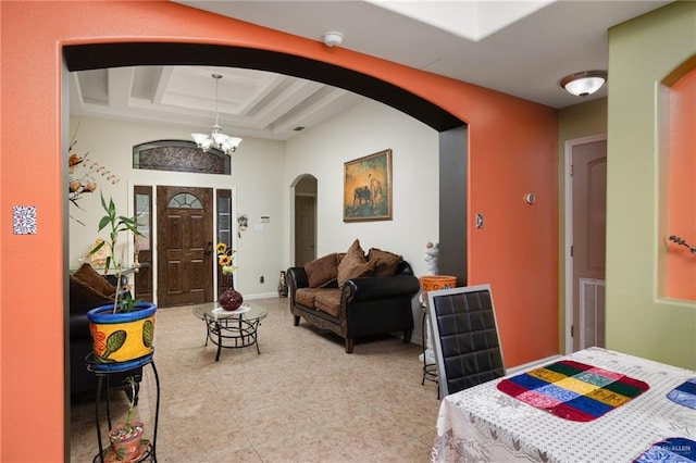 1904 E Hibiscus Ave, Hidalgo, TX 78557 - tiled entrance foyer featuring arched walkways and a chandelier