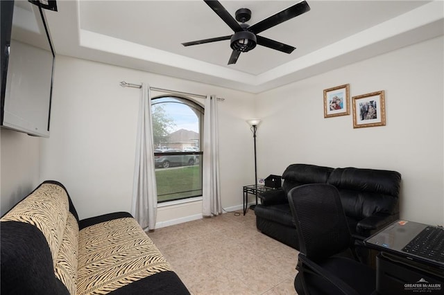 1904 E Hibiscus Ave, Hidalgo, TX 78557 - office area with a tray ceiling, ceiling fan, light tile patterned flooring, and baseboards