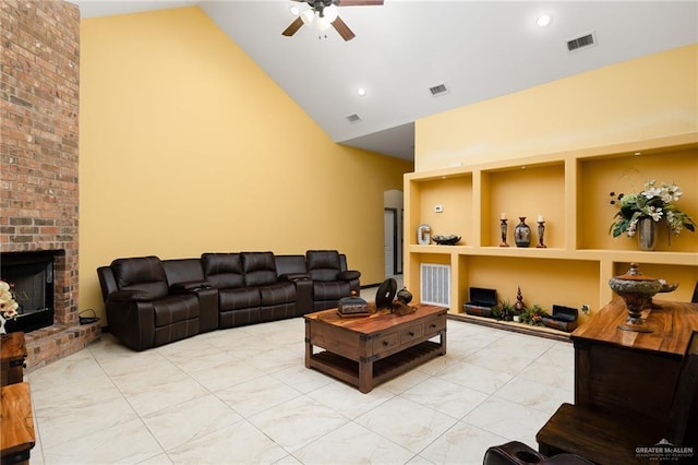5514 N Minnesota Rd, Mission, TX 78574 - living room with high vaulted ceiling, a ceiling fan, a brick fireplace, built in features, and recessed lighting