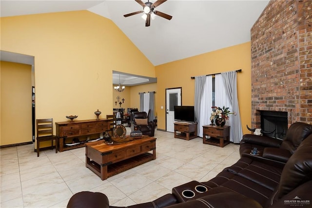 5514 N Minnesota Rd, Mission, TX 78574 - living room with high vaulted ceiling, ceiling fan, and a brick fireplace
