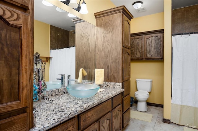 5514 N Minnesota Rd, Mission, TX 78574 - bathroom featuring vanity, tile patterned flooring, and a shower with shower curtain