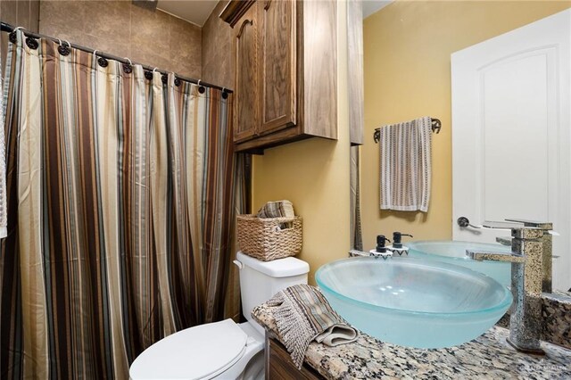 5514 N Minnesota Rd, Mission, TX 78574 - bathroom featuring vanity and a shower with shower curtain