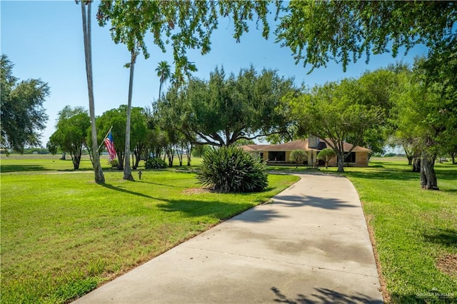 5129 N Mile 5 1/2 Rd W, Weslaco, TX 78599 - view of front facade featuring a front lawn