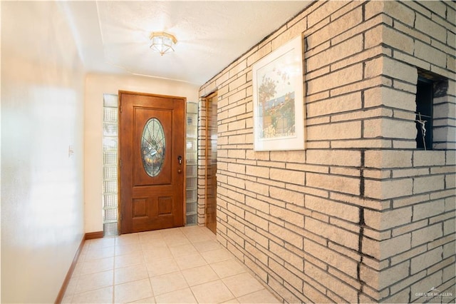 5129 N Mile 5 1/2 Rd W, Weslaco, TX 78599 - entrance foyer featuring baseboards and light tile patterned flooring