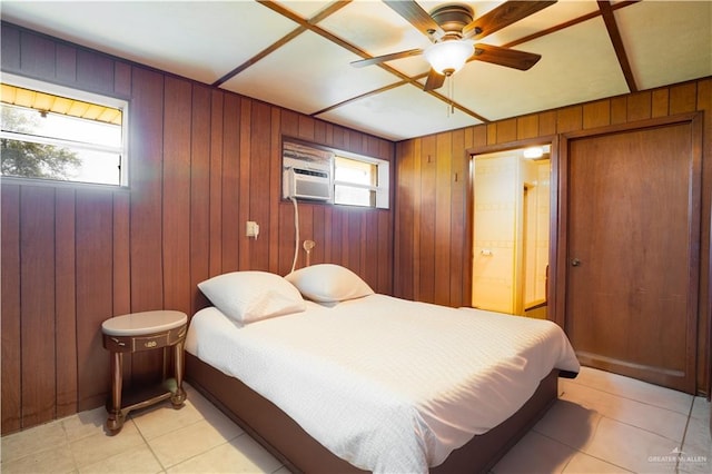 5129 N Mile 5 1/2 Rd W, Weslaco, TX 78599 - bedroom with wooden walls, light tile patterned flooring, a ceiling fan, and a wall mounted air conditioner