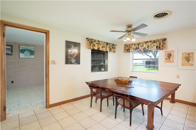 5129 N Mile 5 1/2 Rd W, Weslaco, TX 78599 - dining area featuring a ceiling fan and baseboards