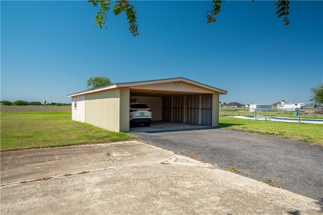 garage with a lawn