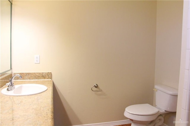 bathroom with toilet and sink