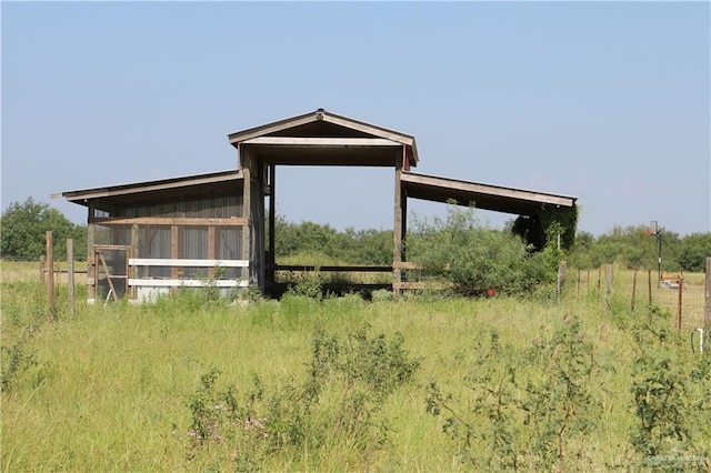 view of outdoor structure featuring a rural view