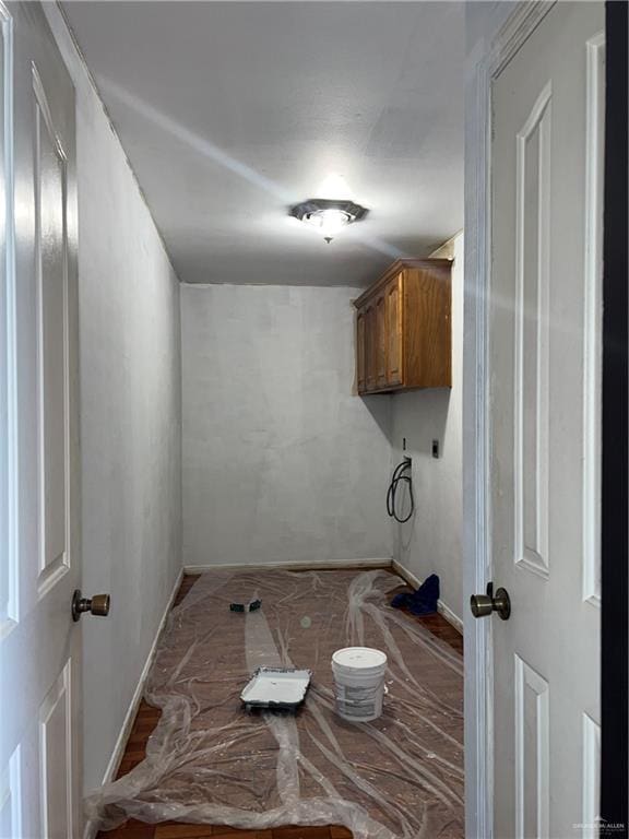 laundry room with cabinets