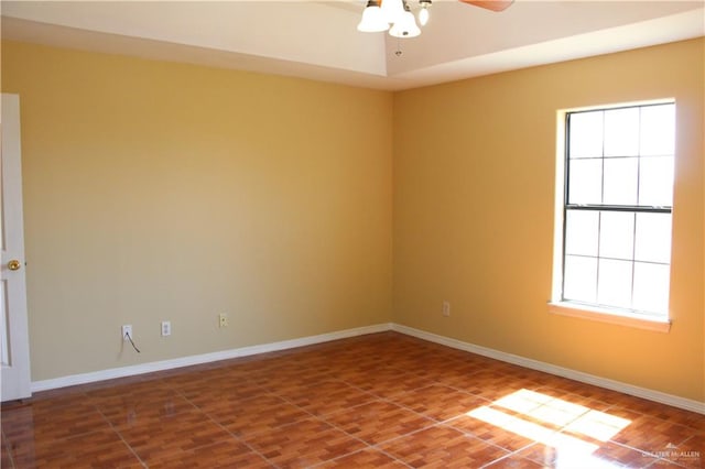 unfurnished room featuring ceiling fan