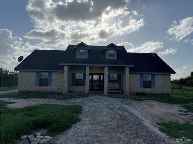 view of front of home featuring covered porch