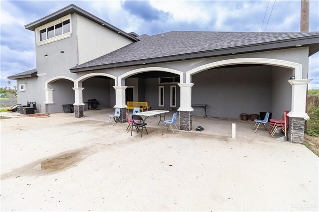 back of house featuring a patio area