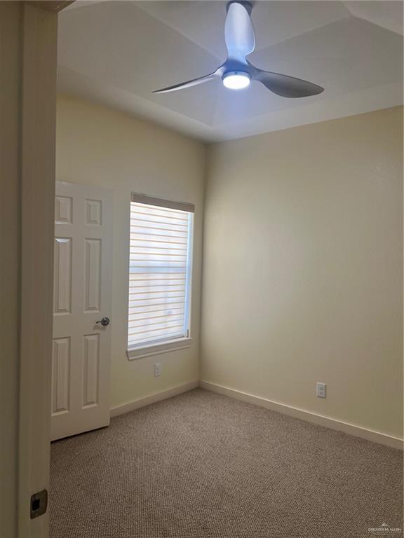 2119 N Ruby St, Edinburg, TX 78541 - unfurnished room featuring carpet and a ceiling fan
