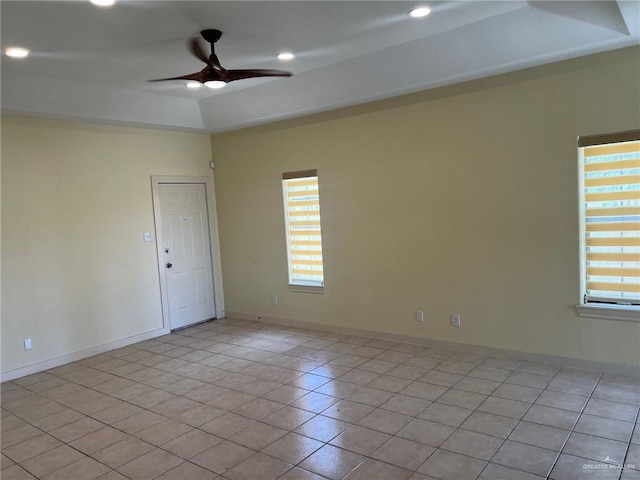 2119 N Ruby St, Edinburg, TX 78541 - unfurnished room with a raised ceiling, ceiling fan, light tile patterned floors, and recessed lighting