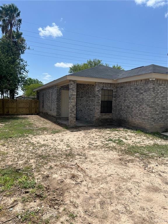 2119 N Ruby St, Edinburg, TX 78541 - view of property exterior featuring brick siding