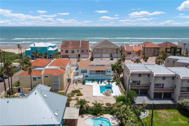 5805 Gulf Blvd, South Padre Island, TX 78597 - aerial view of residential area with a pool area and a large body of water